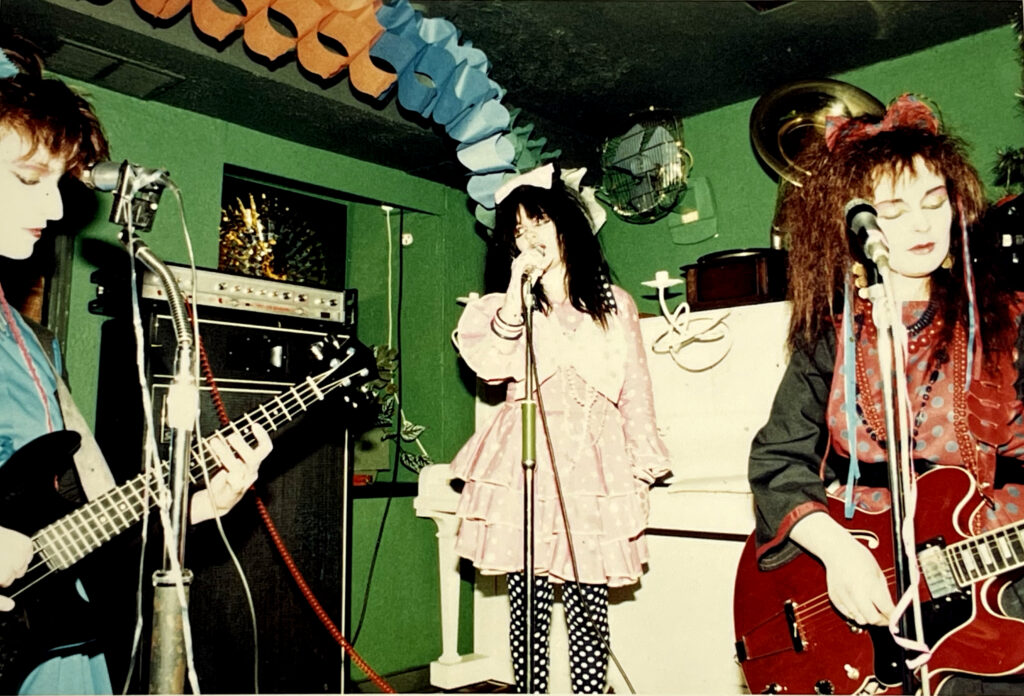 First ever Strawberry Switchblade gig, Spaghetti Factory, Glasgow, December 1981. Janice Goodlett (bass), Rose McDowall (vocals), Jill Bryson (guitar). Pic used by kind permission of Peter Anthony McArthur, who retains copyright.